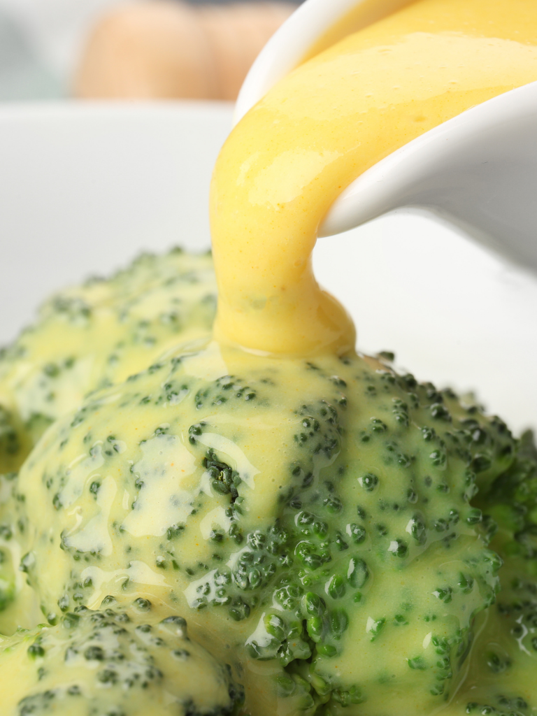 O'Brien potatoes with Broccoli and Cheese Sauce